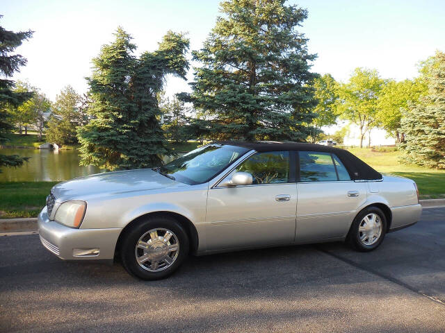 cadillac deville 2004 1G6KD54Y84U171090 image cadillac deville 2004 1G6KD54Y84U171090 image