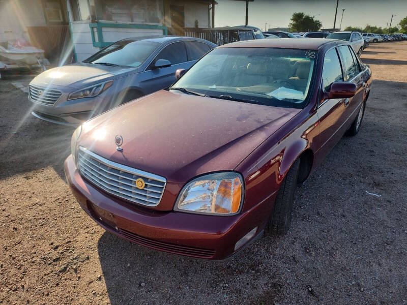 cadillac deville 2000 1G6KD54Y7YU185424 image cadillac deville 2000 1G6KD54Y7YU185424 image